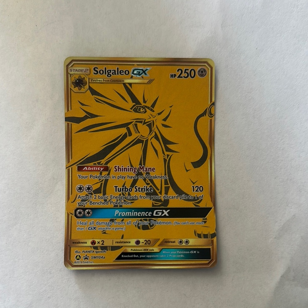 Pokemon Solgaleo GX Card - Gold and Black